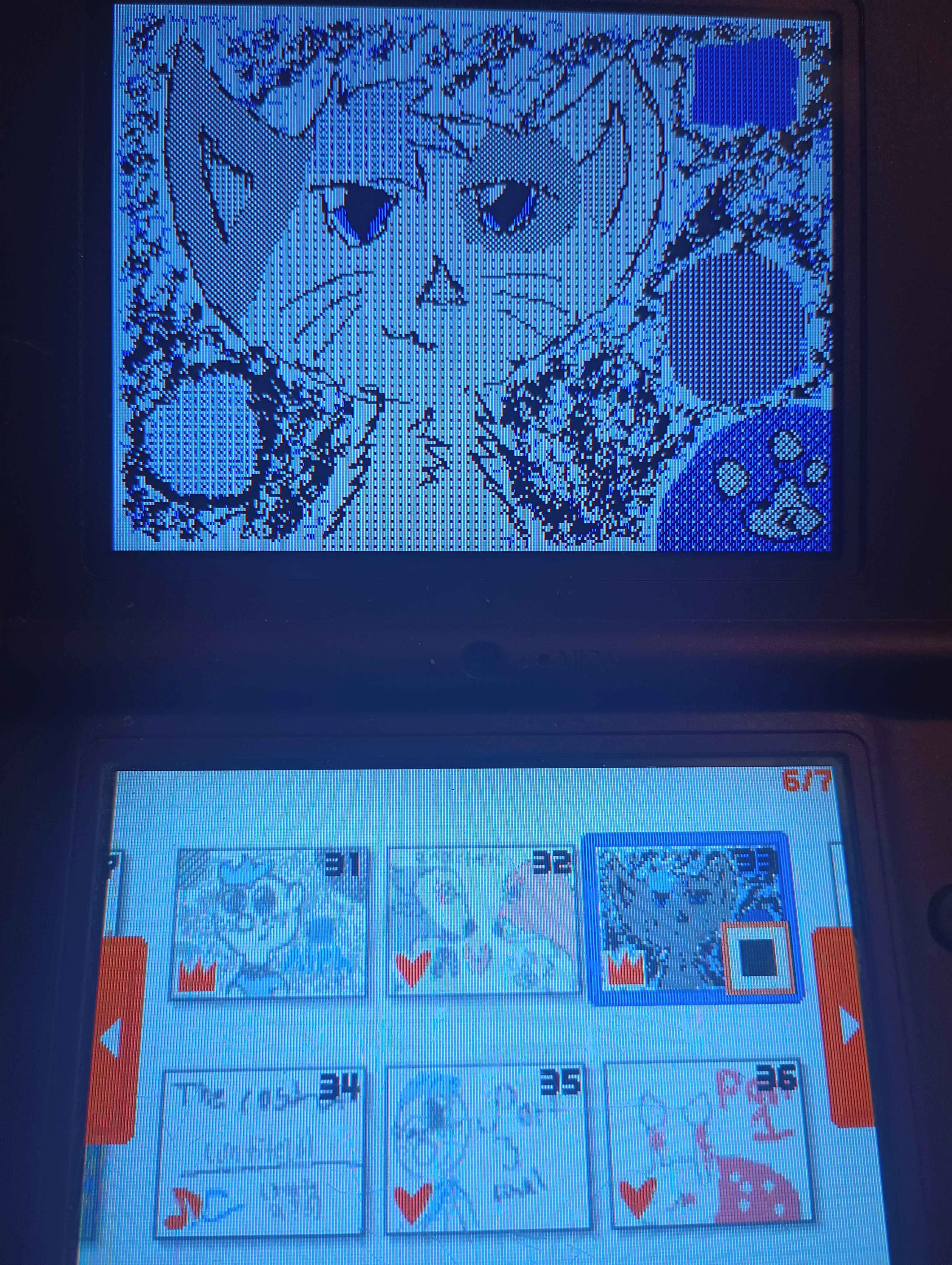 photo of a flipnote on a dsi. It is a drawing of a blue anime cat with dots around it and a pawprint in the corner.
